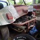 The engine cover is just riveted to the body